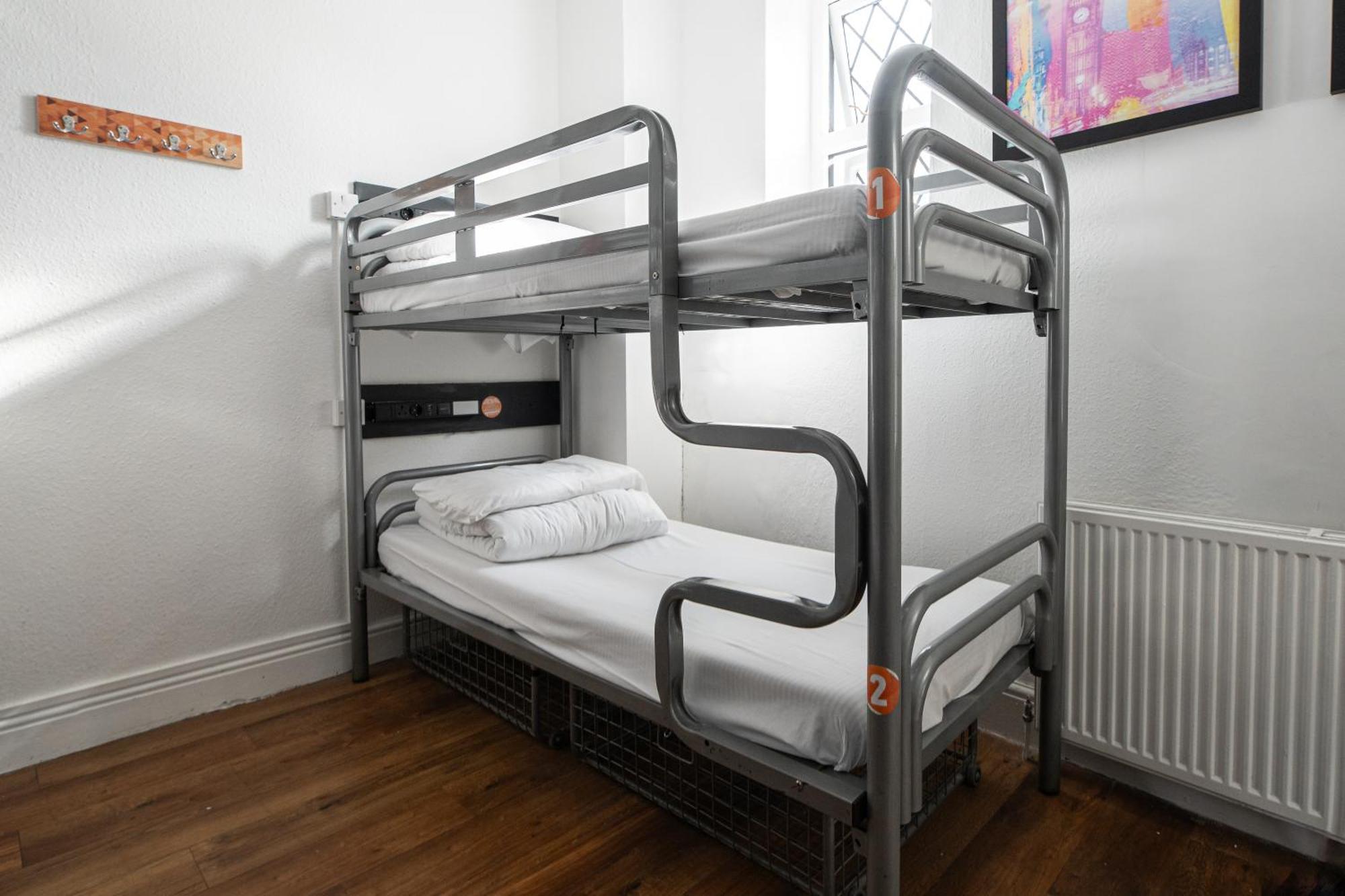 Cama en habitación compartida mixta de 8 camas